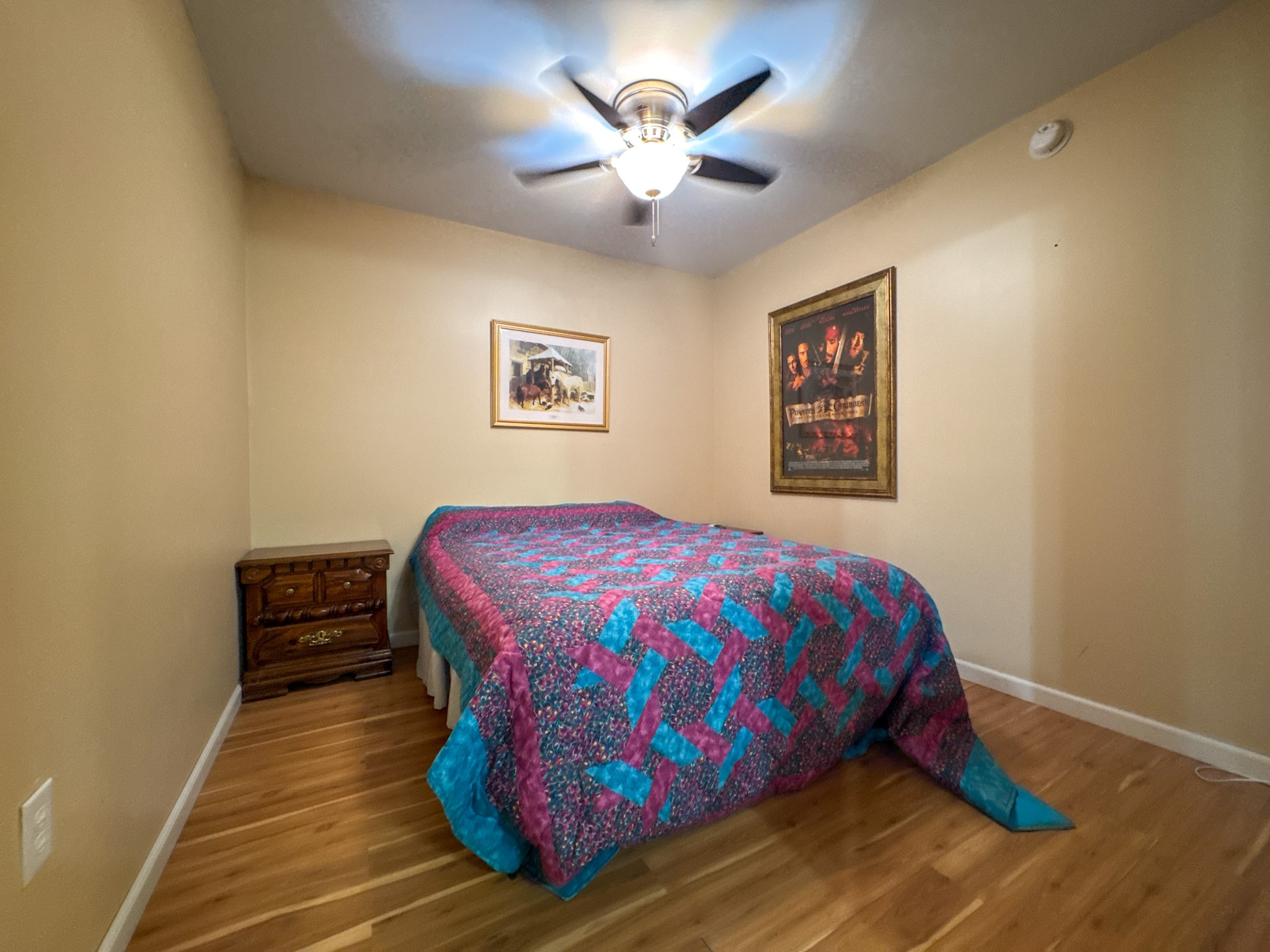 4791 Guys Chewalla Road Ramer, TN 38367 - Photo 29 of 77 a bedroom with a bed and a chandelier