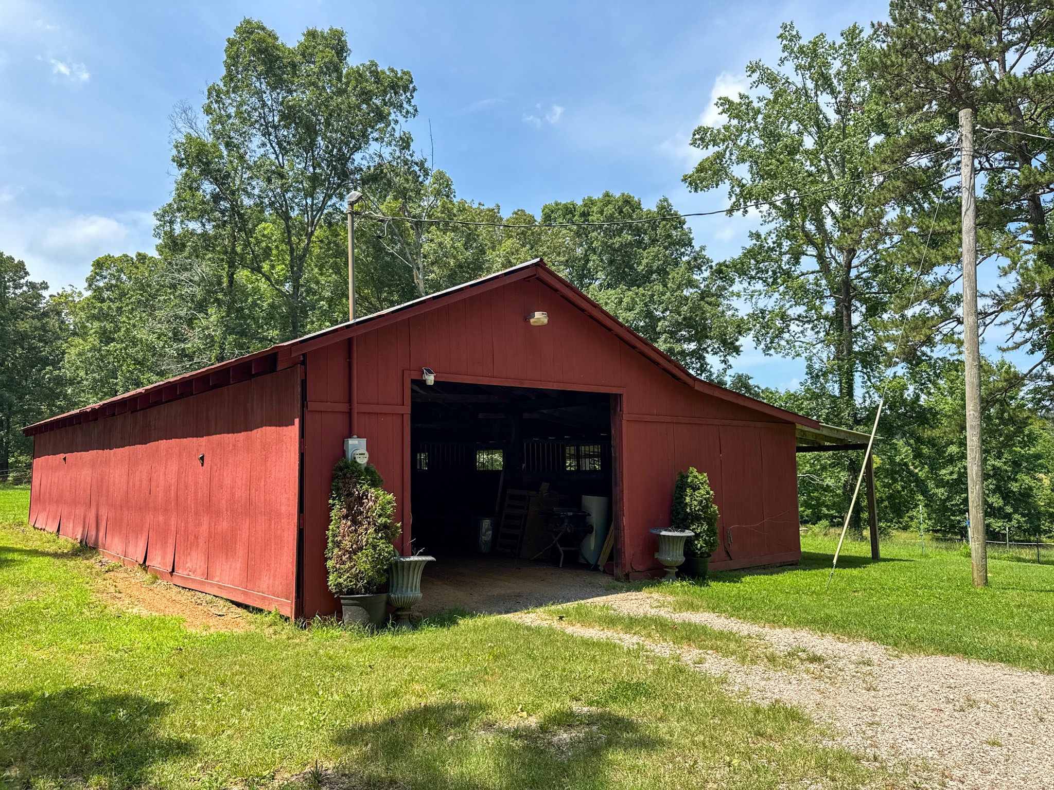 4791 Guys Chewalla Road Ramer, TN 38367 - Photo 34 of 77 a front view of a house with a garden and yard