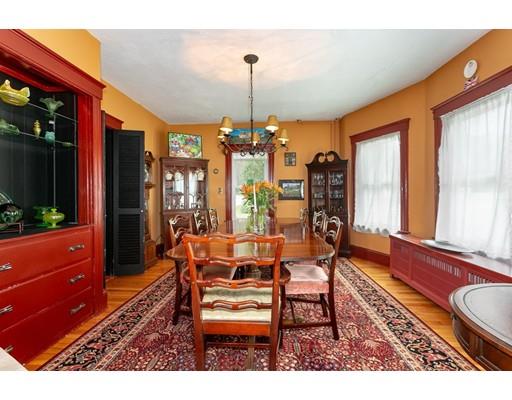 267 North Road Sudbury, MA 01776 - Photo 12 of 23 a dining room with furniture a chandelier and wooden floor