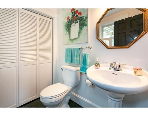 267 North Road Sudbury, MA 01776 - Photo 13 of 23 a bathroom with a sink a mirror and a toilet