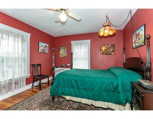 267 North Road Sudbury, MA 01776 - Photo 17 of 23 a bedroom with a bed and wooden floor
