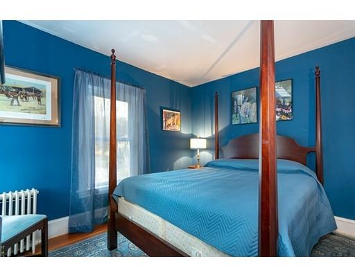 267 North Road Sudbury, MA 01776 - Photo 19 of 23 a bedroom with a bed and wooden floor
