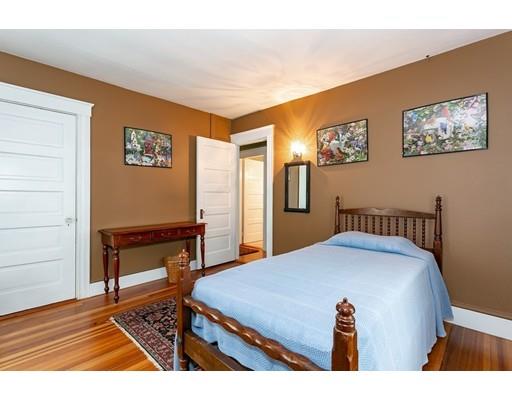 267 North Road Sudbury, MA 01776 - Photo 21 of 23 a bedroom with a bed and wooden floor