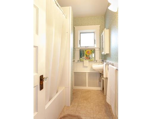 267 North Road Sudbury, MA 01776 - Photo 22 of 23 a bathroom with a sink a mirror and a bathtub