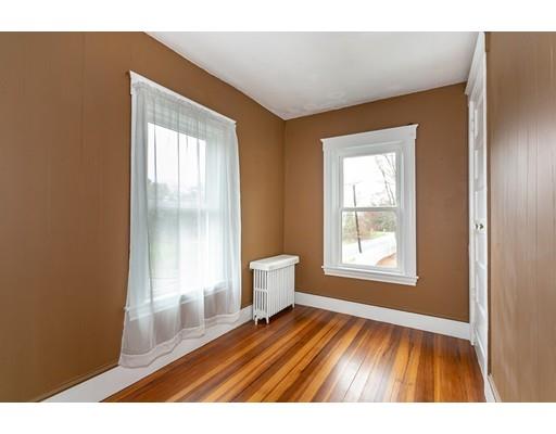 267 North Road Sudbury, MA 01776 - Photo 23 of 23 a view of an empty room with wooden floor and a window