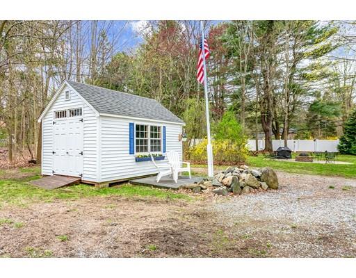 267 North Road Sudbury, MA 01776 - Photo 5 of 23 a view of a house with backyard and trees