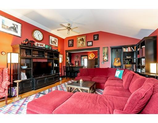 267 North Road Sudbury, MA 01776 - Photo 9 of 23 a view of a living room with furniture a flat screen tv and a fireplace