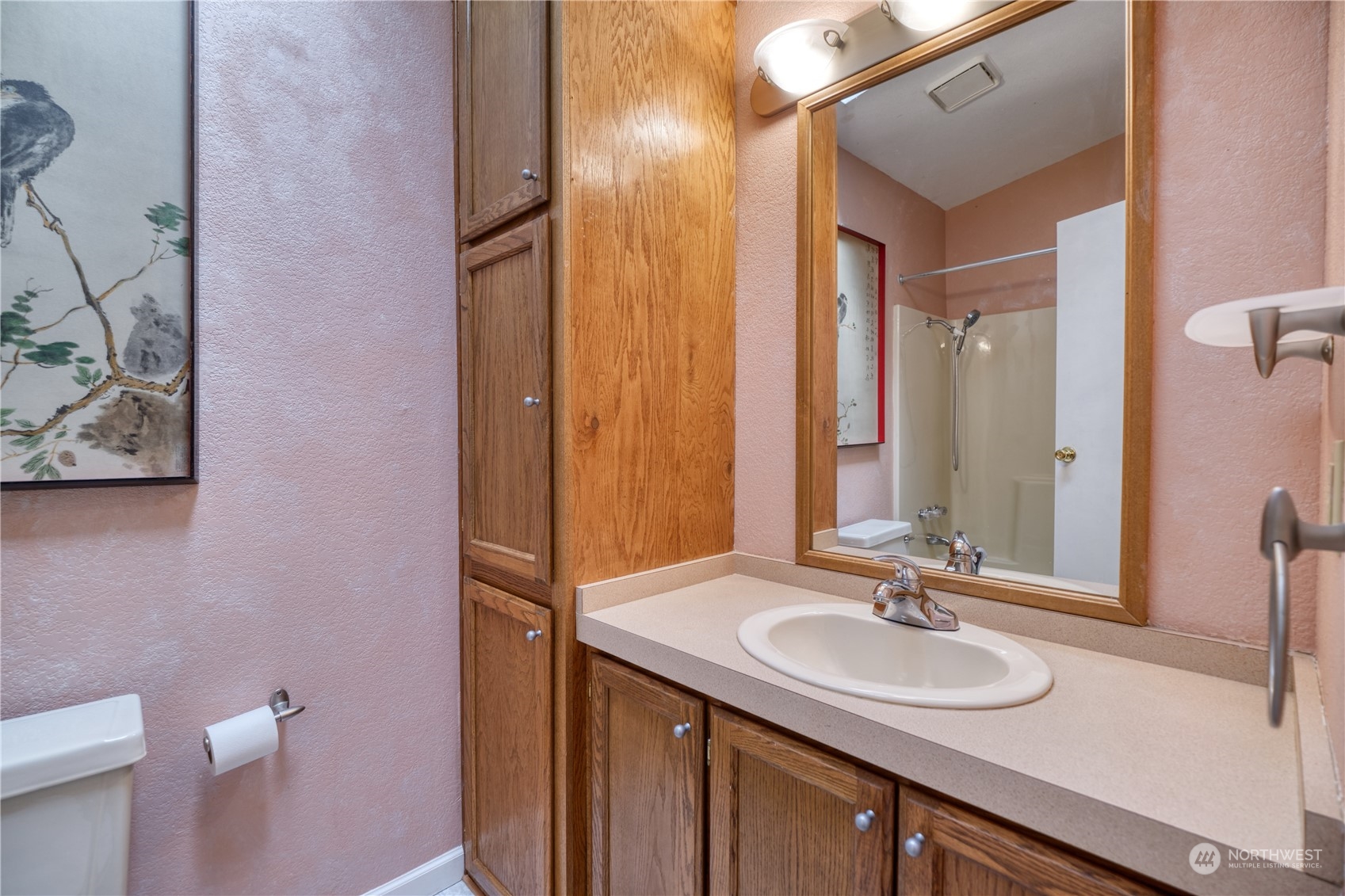 1721 Benson Road, Unit 119 Point Roberts, WA 98281 - Photo 13 of 24 a bathroom with a sink and a mirror