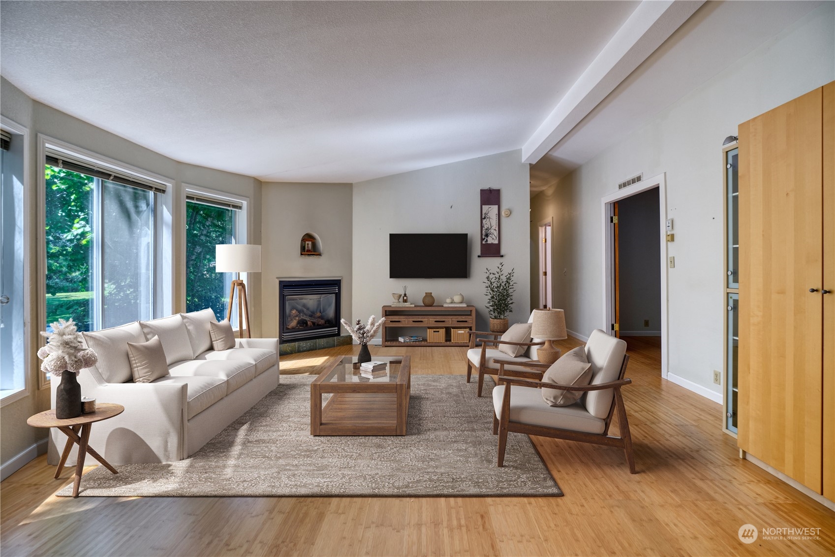 1721 Benson Road, Unit 119 Point Roberts, WA 98281 - Photo 2 of 24 a living room with fireplace furniture and a flat screen tv