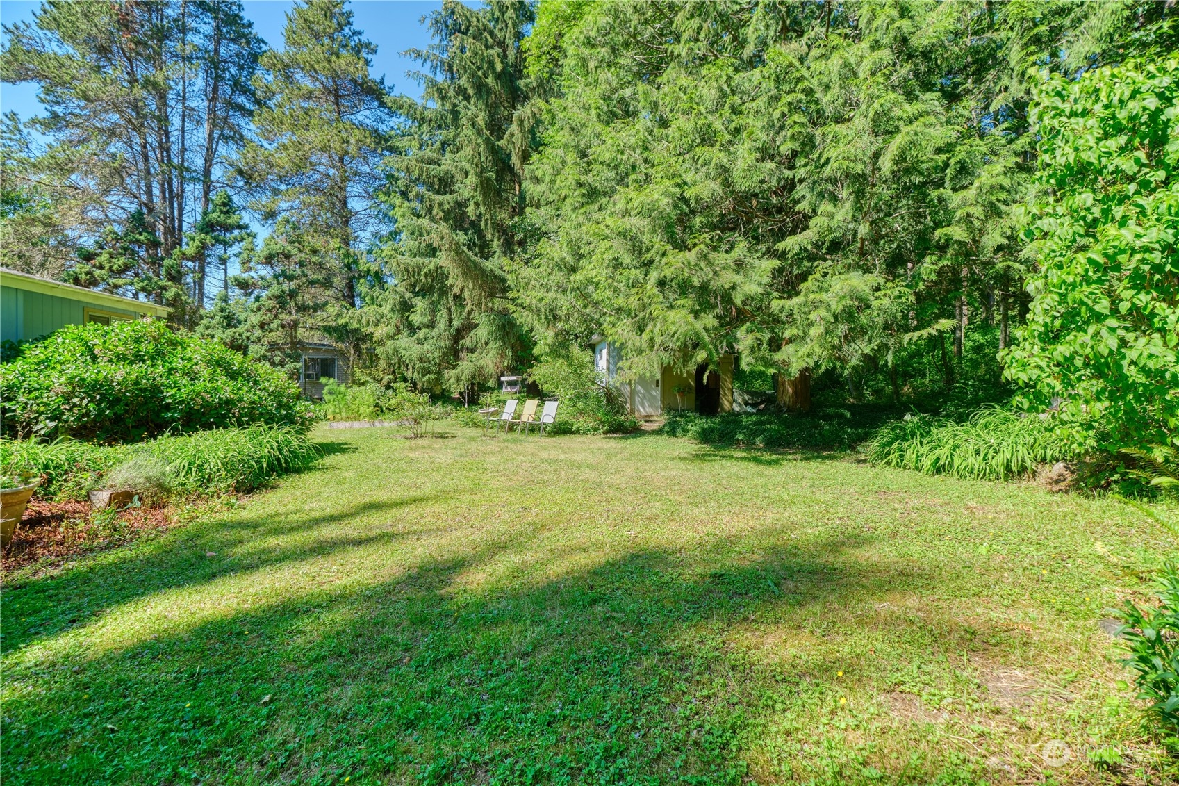 1721 Benson Road, Unit 119 Point Roberts, WA 98281 - Photo 21 of 24 a view of outdoor space with deck and yard