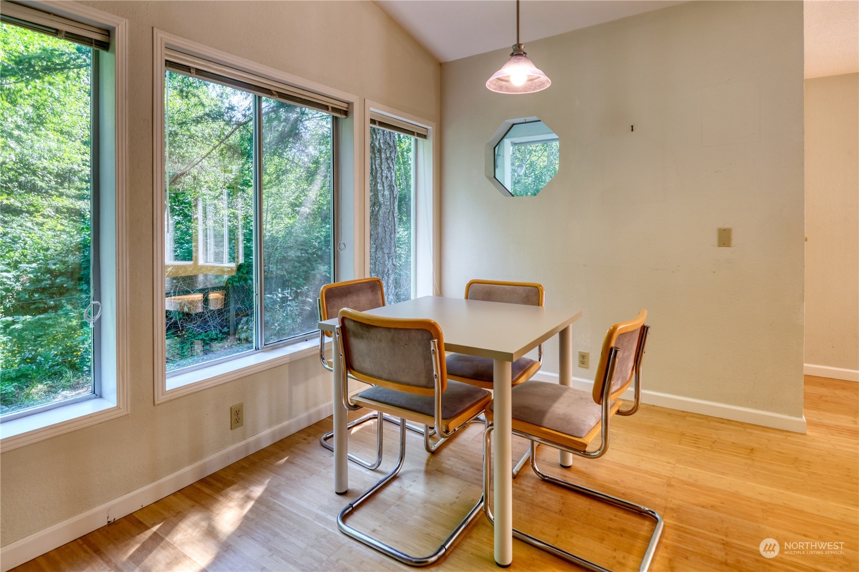 1721 Benson Road, Unit 119 Point Roberts, WA 98281 - Photo 3 of 24 a view of a dining room with furniture window and outside view