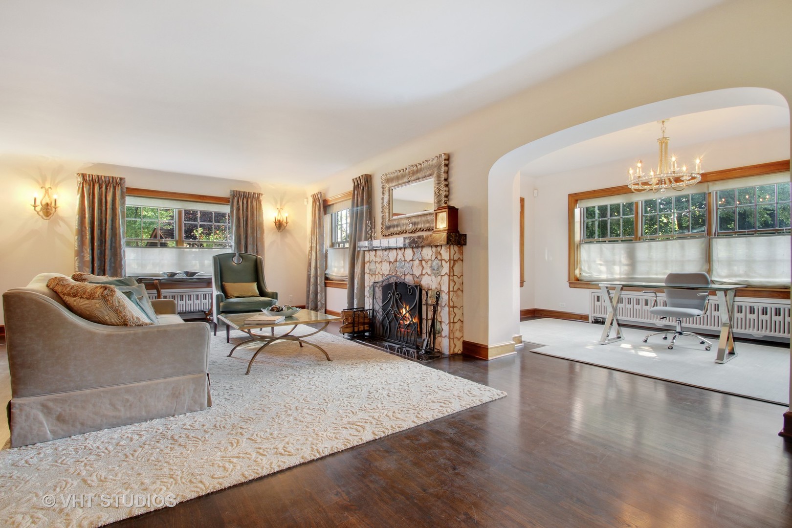 5900 North Kilpatrick Avenue Chicago, IL 60646 - Photo 2 of 21 a living room with furniture and a fireplace
