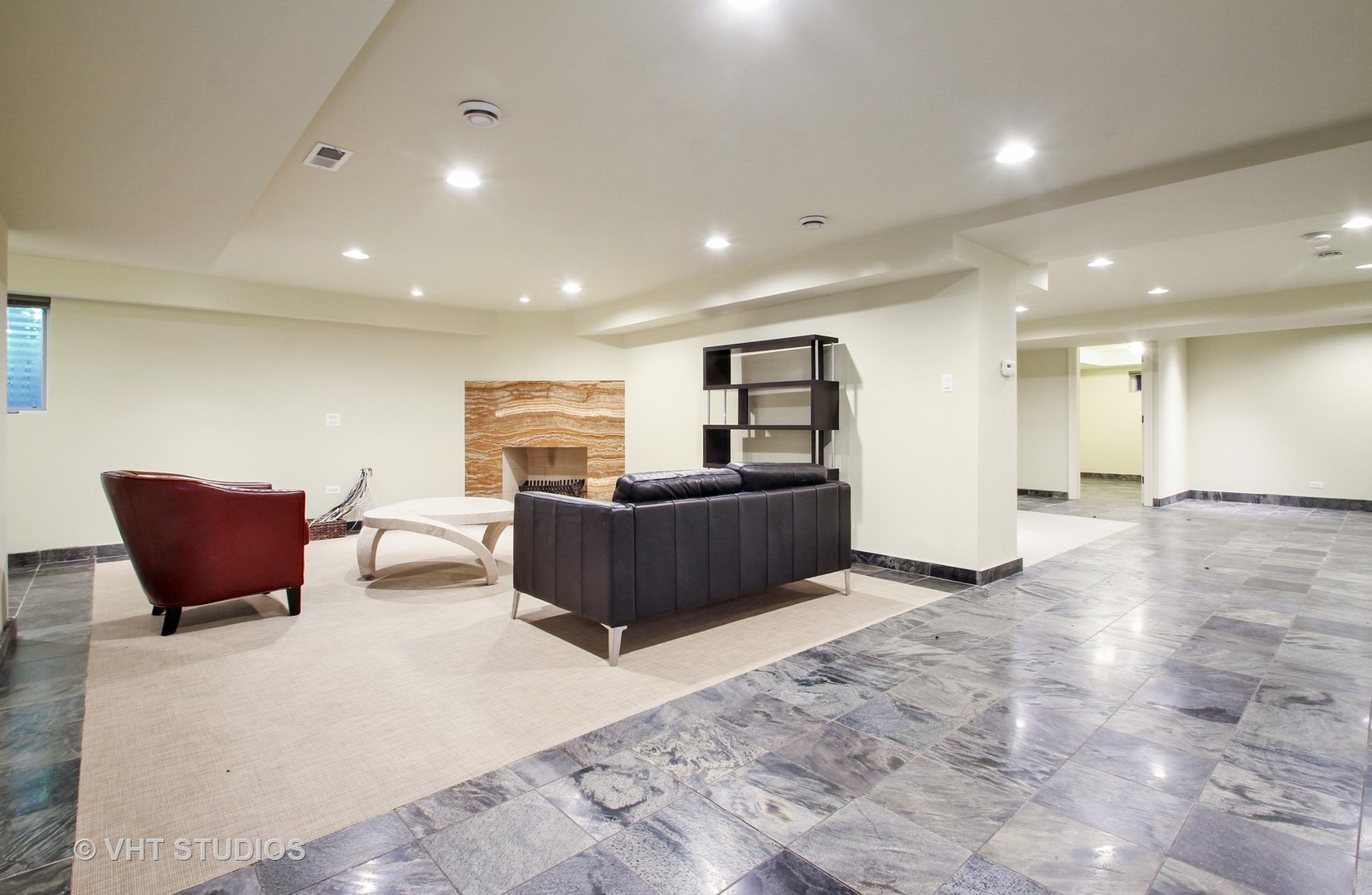 5900 North Kilpatrick Avenue Chicago, IL 60646 - Photo 16 of 21 a living room with furniture and a flat screen tv