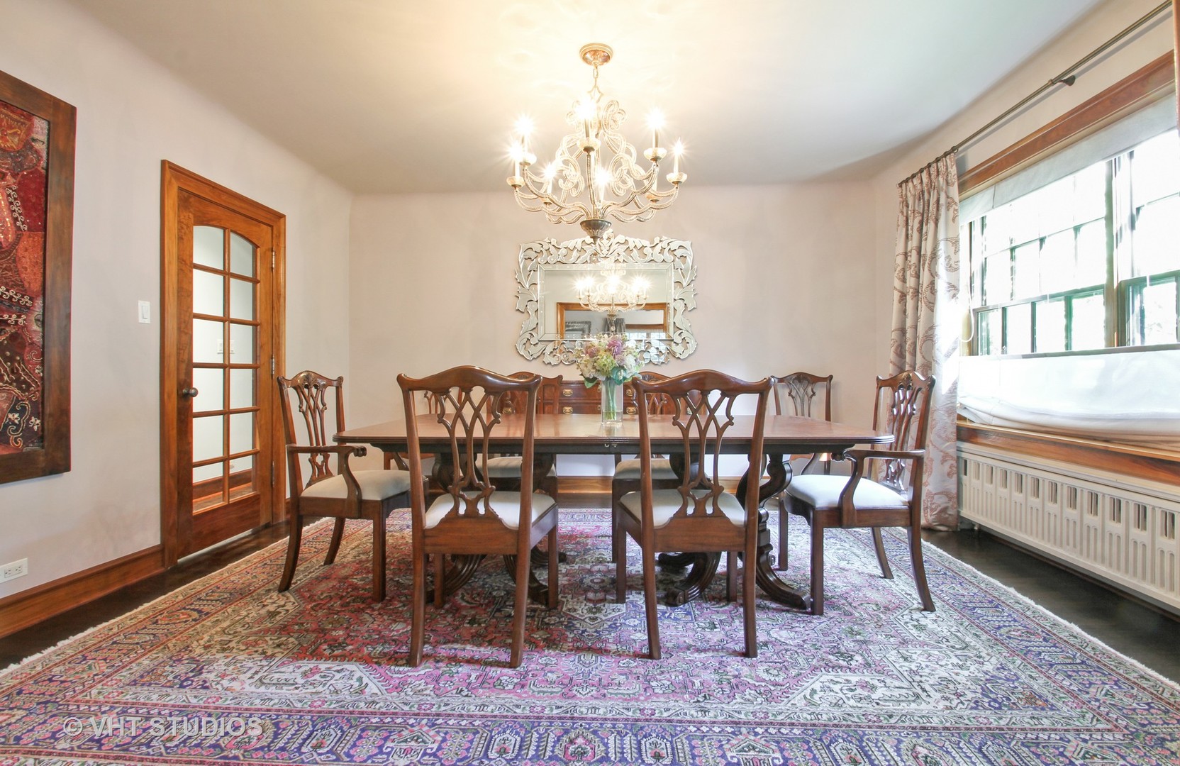 5900 North Kilpatrick Avenue Chicago, IL 60646 - Photo 3 of 21 a view of a dining room with furniture and chandelier