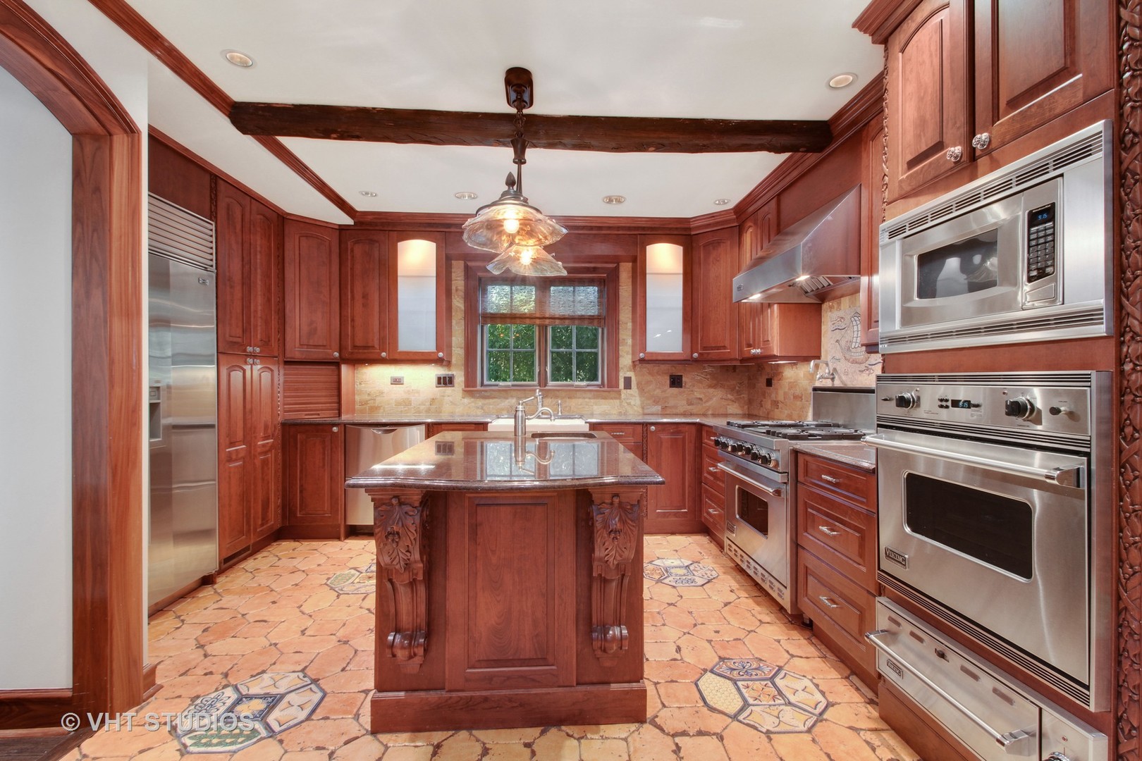 5900 North Kilpatrick Avenue Chicago, IL 60646 - Photo 21 of 21 a kitchen with stainless steel appliances granite countertop a stove a sink and a refrigerator