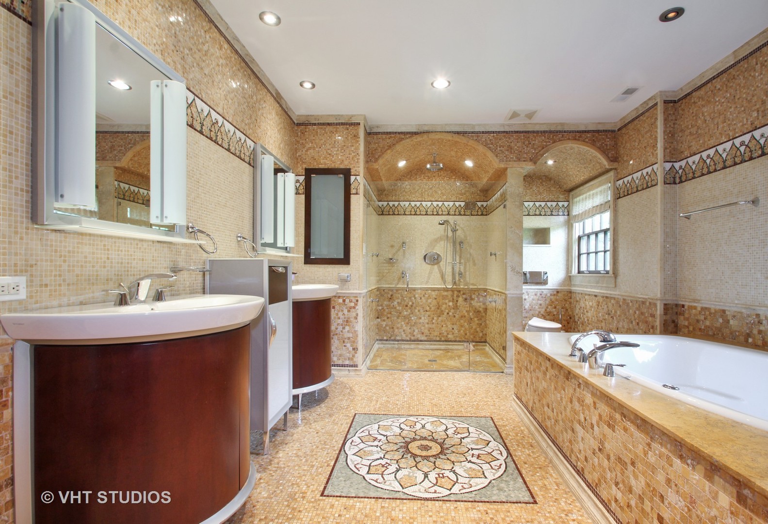 5900 North Kilpatrick Avenue Chicago, IL 60646 - Photo 8 of 21 a bathroom with a bathtub a sink and a large mirror