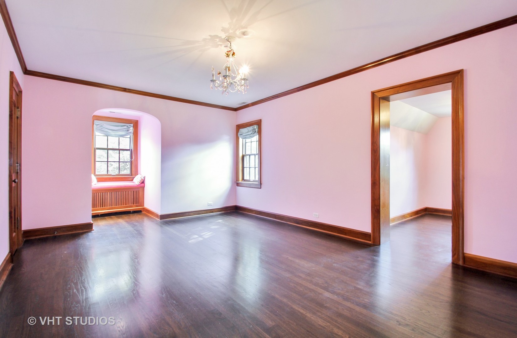 5900 North Kilpatrick Avenue Chicago, IL 60646 - Photo 10 of 21 a view of an empty room with window and wooden floor