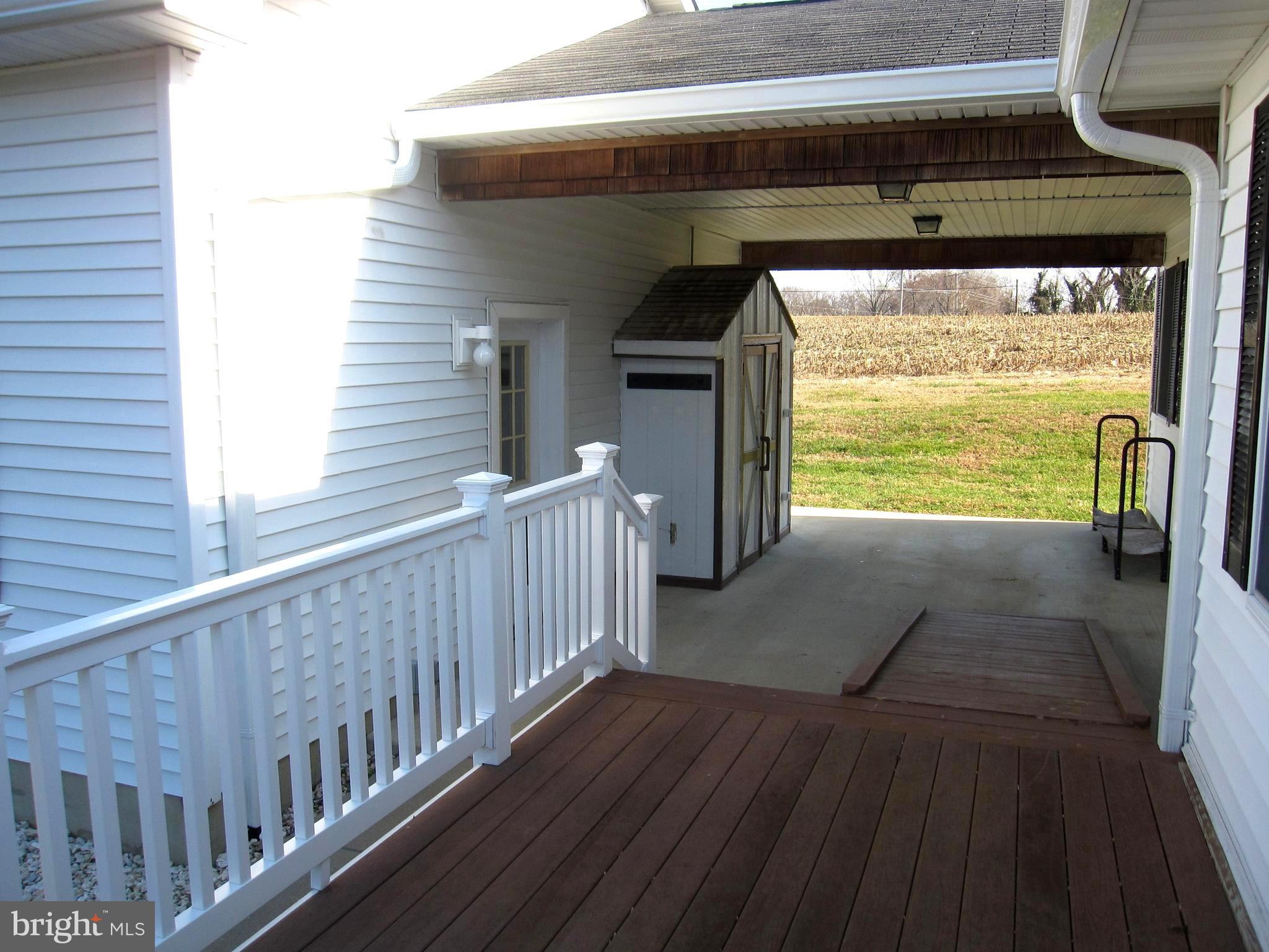 231 Deale Road Tracys Landing, MD 20779 - Photo 38 of 43 a view of deck and a floor to ceiling window