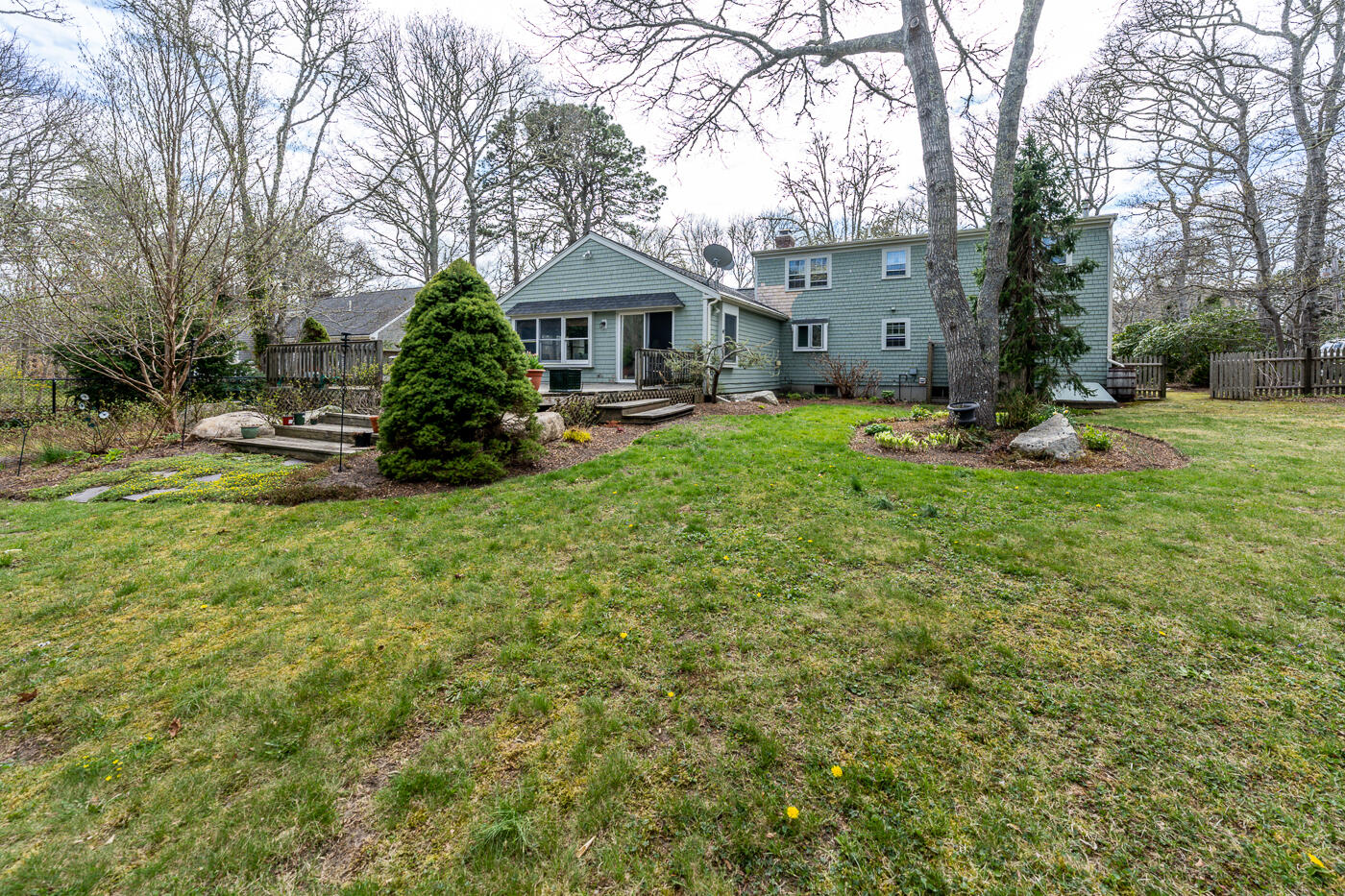 45 Sheffield Road Brewster, MA 02631 - Photo 20 of 25 a front view of a house with garden