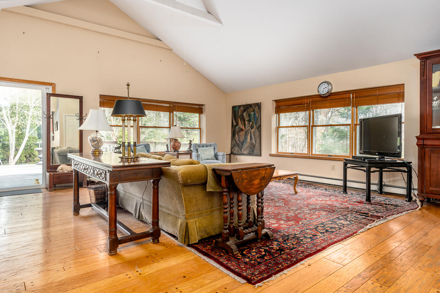 45 Sheffield Road Brewster, MA 02631 - Photo 3 of 25 a living room with fireplace furniture and a large window