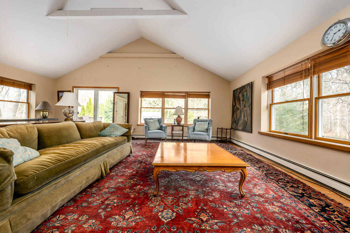 45 Sheffield Road Brewster, MA 02631 - Photo 4 of 25 a living room with a couch and large windows