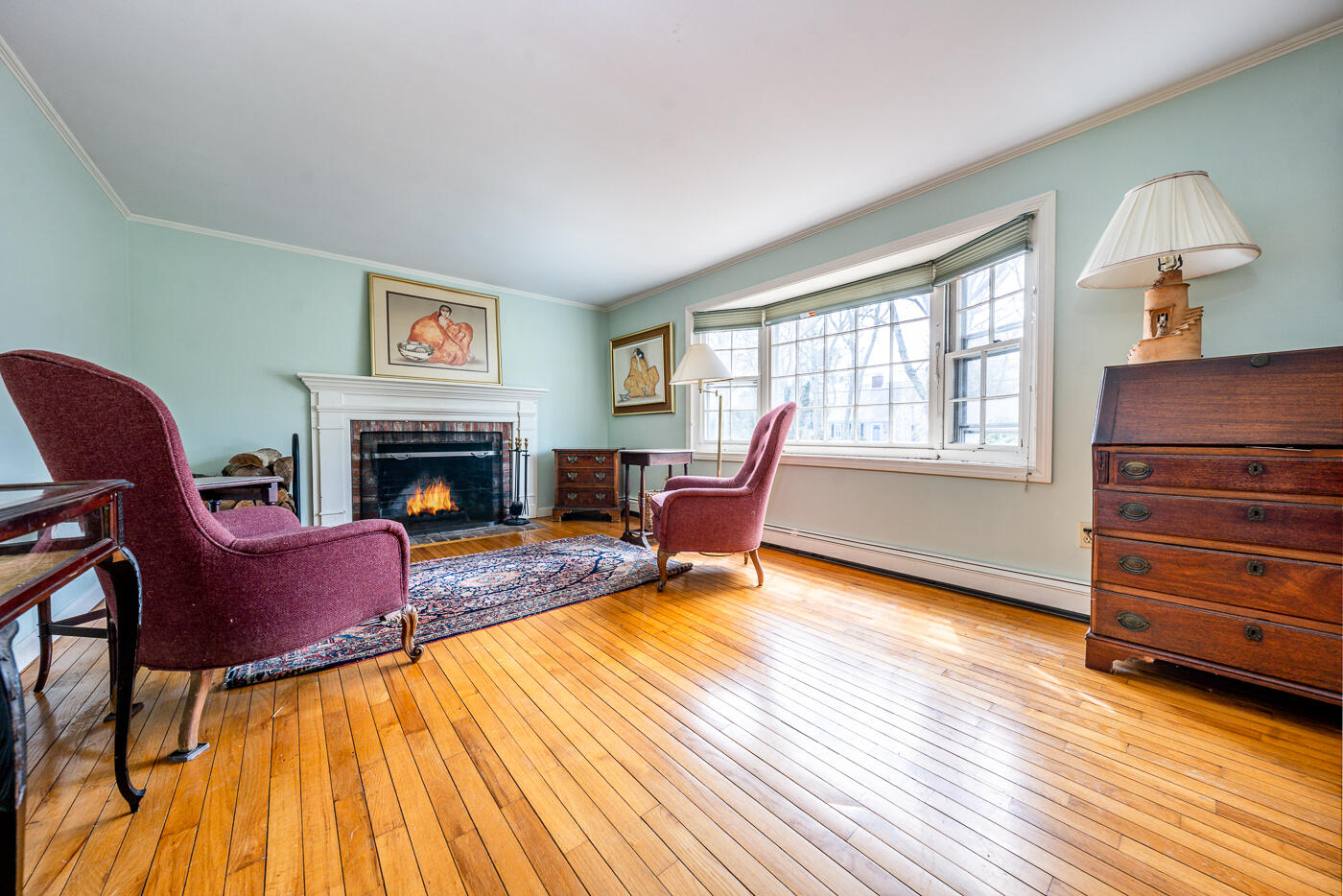 45 Sheffield Road Brewster, MA 02631 - Photo 10 of 25 a living room with furniture and a fireplace