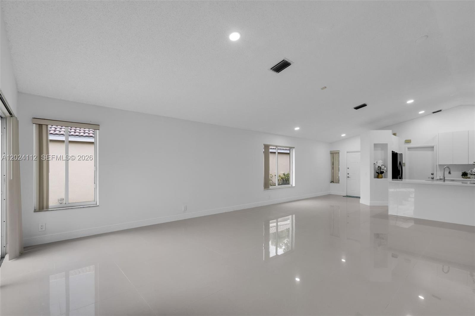 4366 Mahogany Ridge Drive Weston, FL 33331 - Photo 11 of 41 a view of an empty room and a window