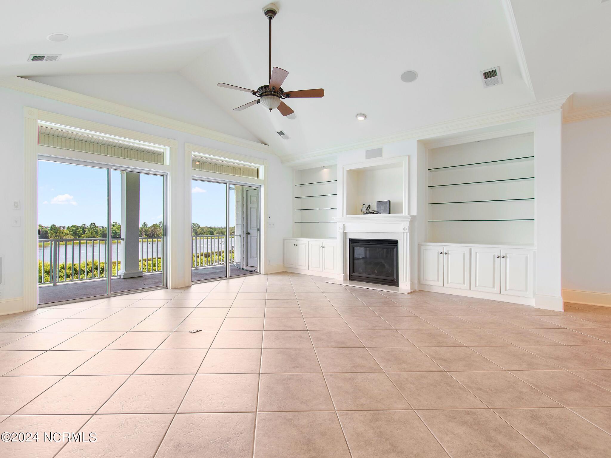 1906 Goose Creek Road Southwest, Unit 2 Ocean Isle Beach, NC 28469 - Photo 6 of 65 Living room on top floor
