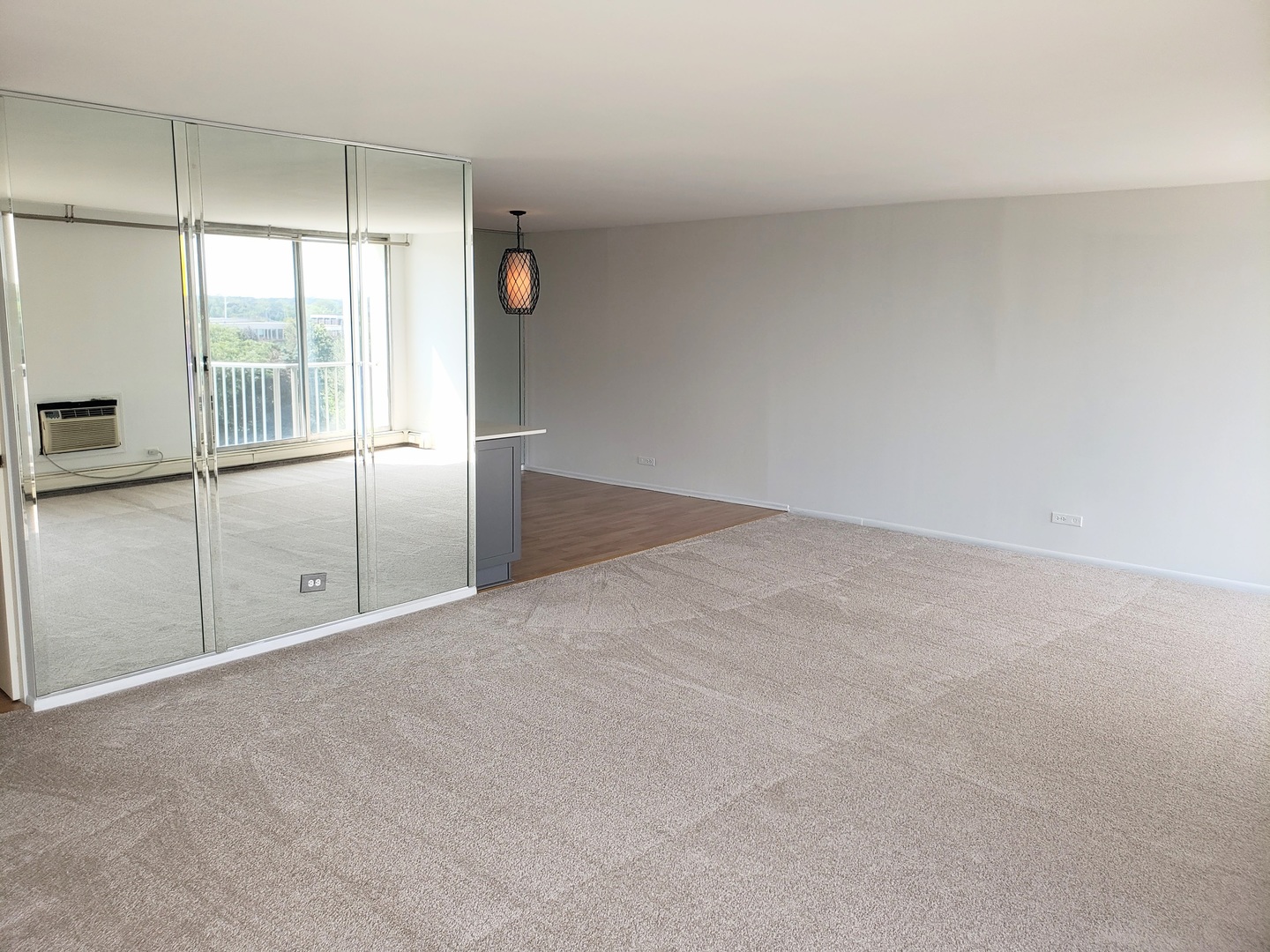 40 North Tower Road, Unit 5B Oak Brook, IL 60523 - Photo 11 of 25 an empty room with sliding glass door