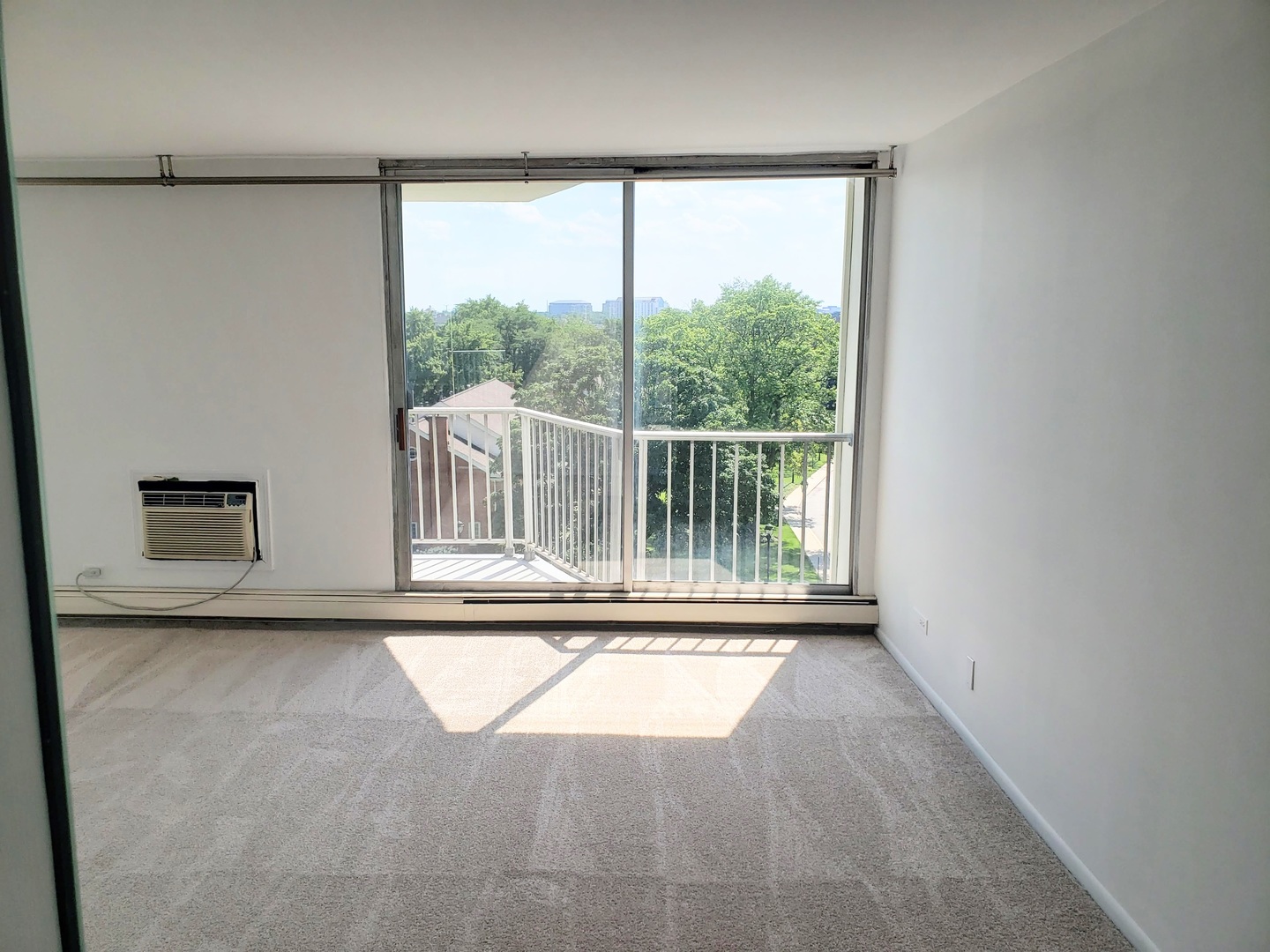 40 North Tower Road, Unit 5B Oak Brook, IL 60523 - Photo 12 of 25 a view of a room that has a window in it