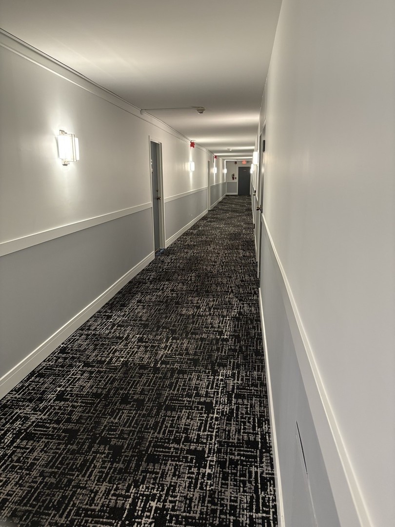 40 North Tower Road, Unit 5B Oak Brook, IL 60523 - Photo 16 of 25 wooden floor in an empty room