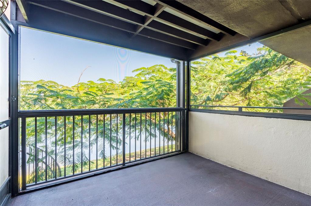 735 South Village Drive, Unit 206 St. Petersburg, FL 33716 - Photo 13 of 45 a view of a porch