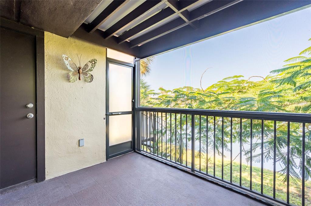 735 South Village Drive, Unit 206 St. Petersburg, FL 33716 - Photo 14 of 45 a view of a porch