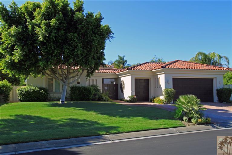 286 Loch Lomond Road Rancho Mirage, CA 92270 - Photo 2 of 24 a front view of house with yard and green space