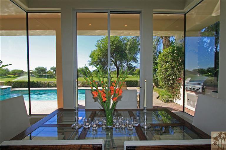 286 Loch Lomond Road Rancho Mirage, CA 92270 - Photo 11 of 24 a view of a floor to ceiling window and potted plants