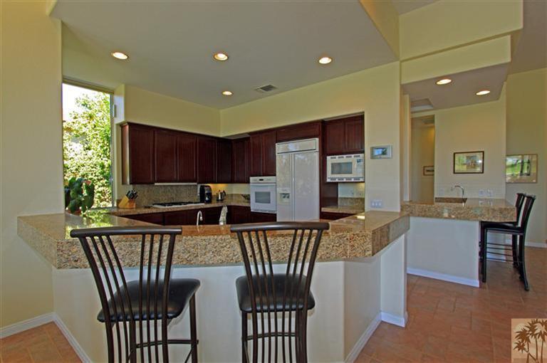 286 Loch Lomond Road Rancho Mirage, CA 92270 - Photo 14 of 24 a view of a dining room with furniture