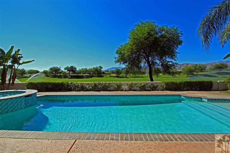 286 Loch Lomond Road Rancho Mirage, CA 92270 - Photo 22 of 24 a view of a golf course with a garden