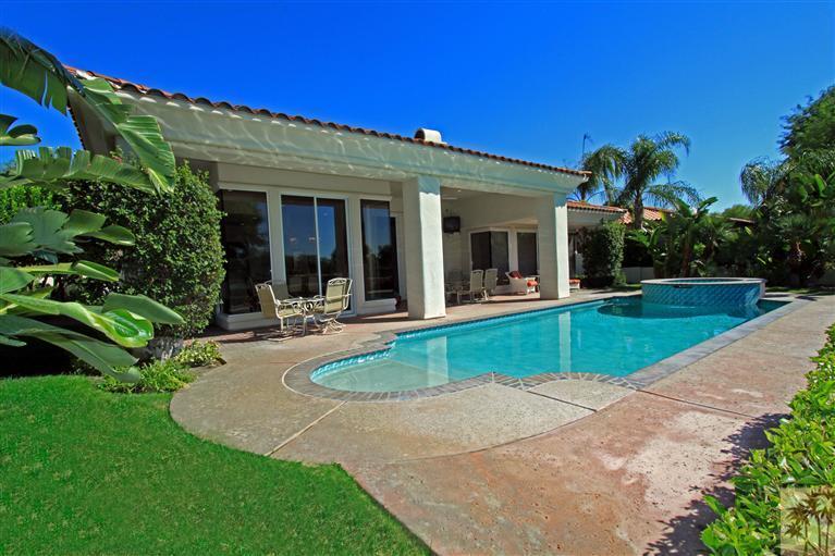 286 Loch Lomond Road Rancho Mirage, CA 92270 - Photo 23 of 24 front view of a house with a yard