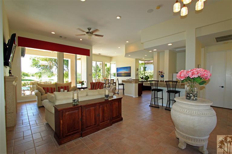 286 Loch Lomond Road Rancho Mirage, CA 92270 - Photo 7 of 24 a living room with furniture and a large window