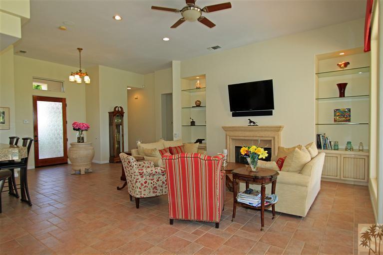 286 Loch Lomond Road Rancho Mirage, CA 92270 - Photo 8 of 24 a living room with furniture and a flat screen tv