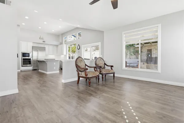 a living room with furniture and a table