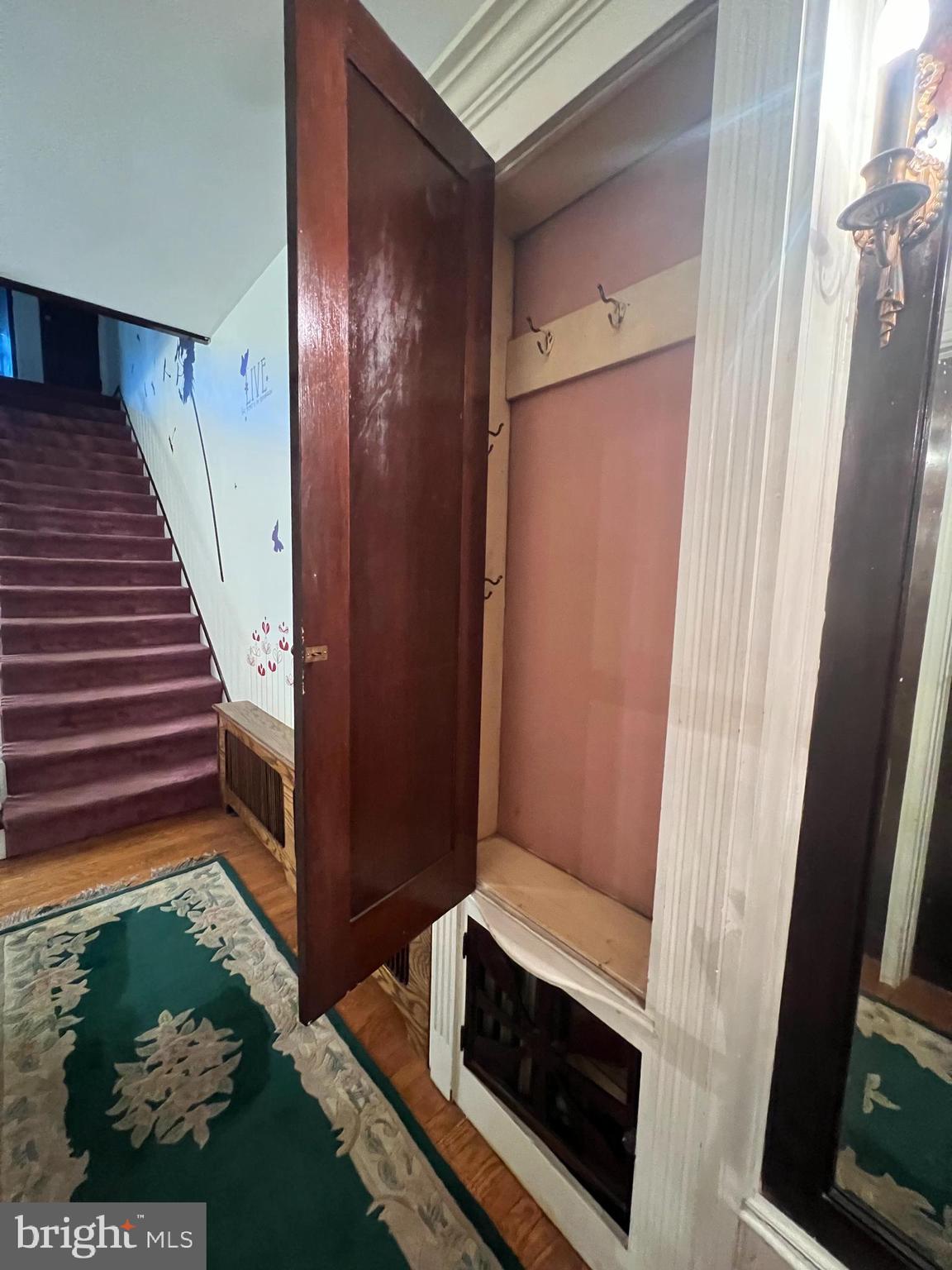 25 Broad Street Ashland, PA 17921 - Photo 11 of 138 a view of hallway with wooden floor and stairs