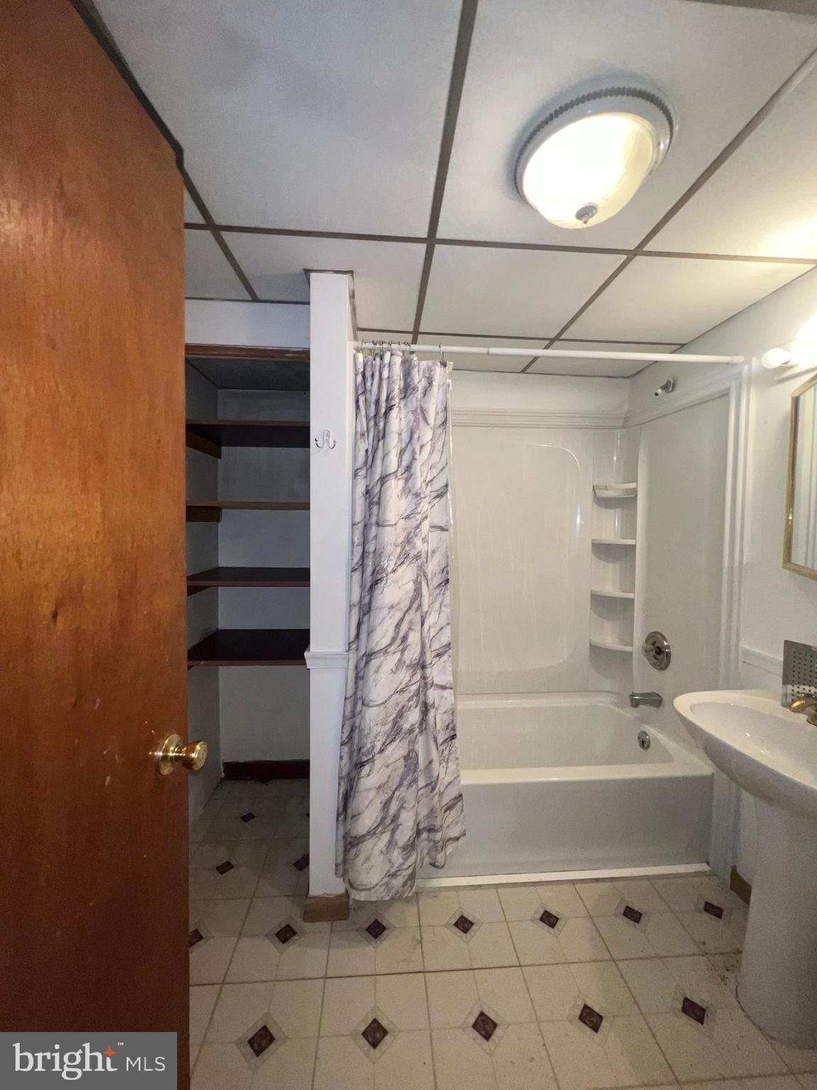 25 Broad Street Ashland, PA 17921 - Photo 112 of 138 a bathroom with a bathtub and shower