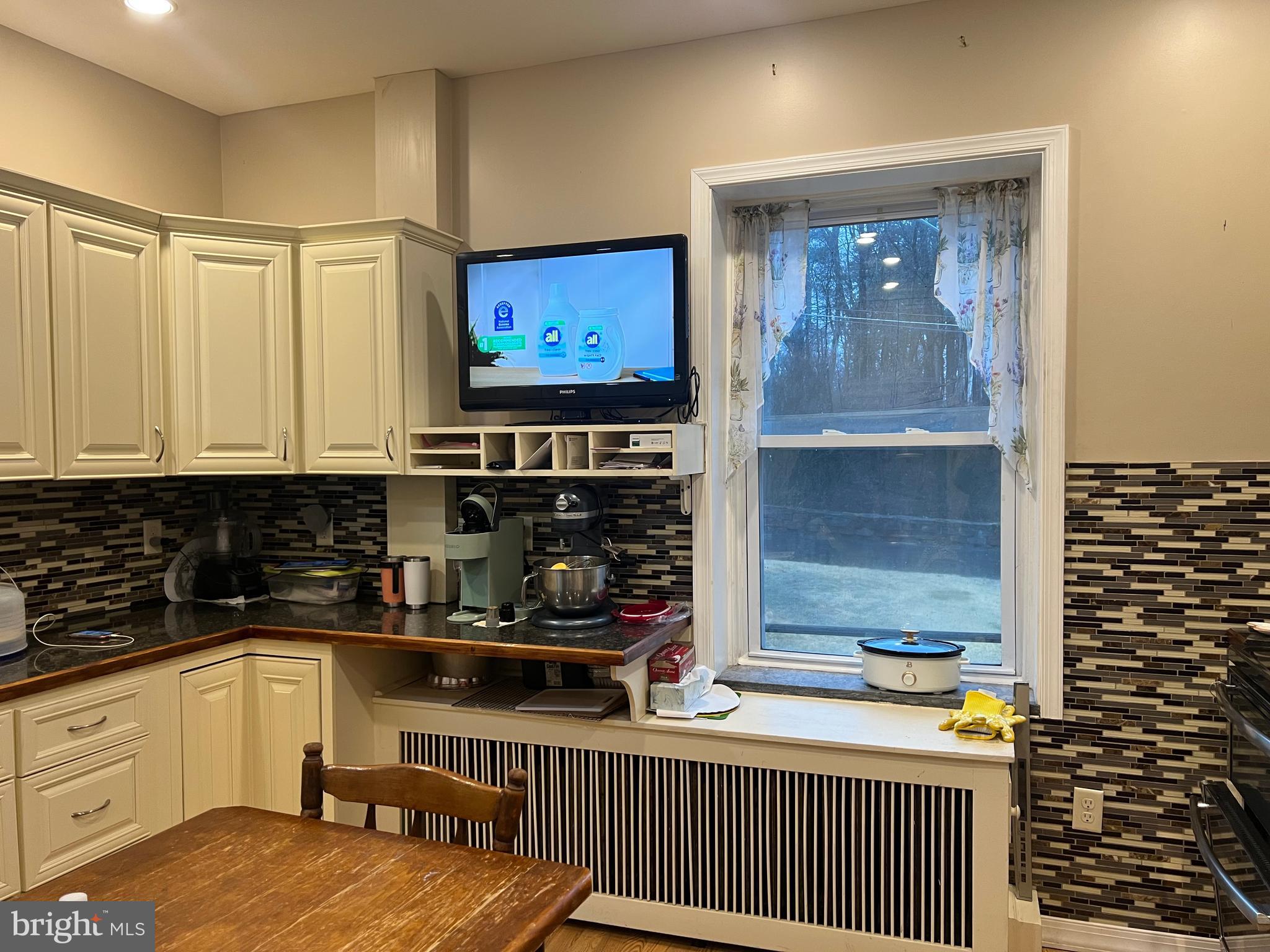 25 Broad Street Ashland, PA 17921 - Photo 13 of 138 a kitchen with stainless steel appliances a stove and a refrigerator