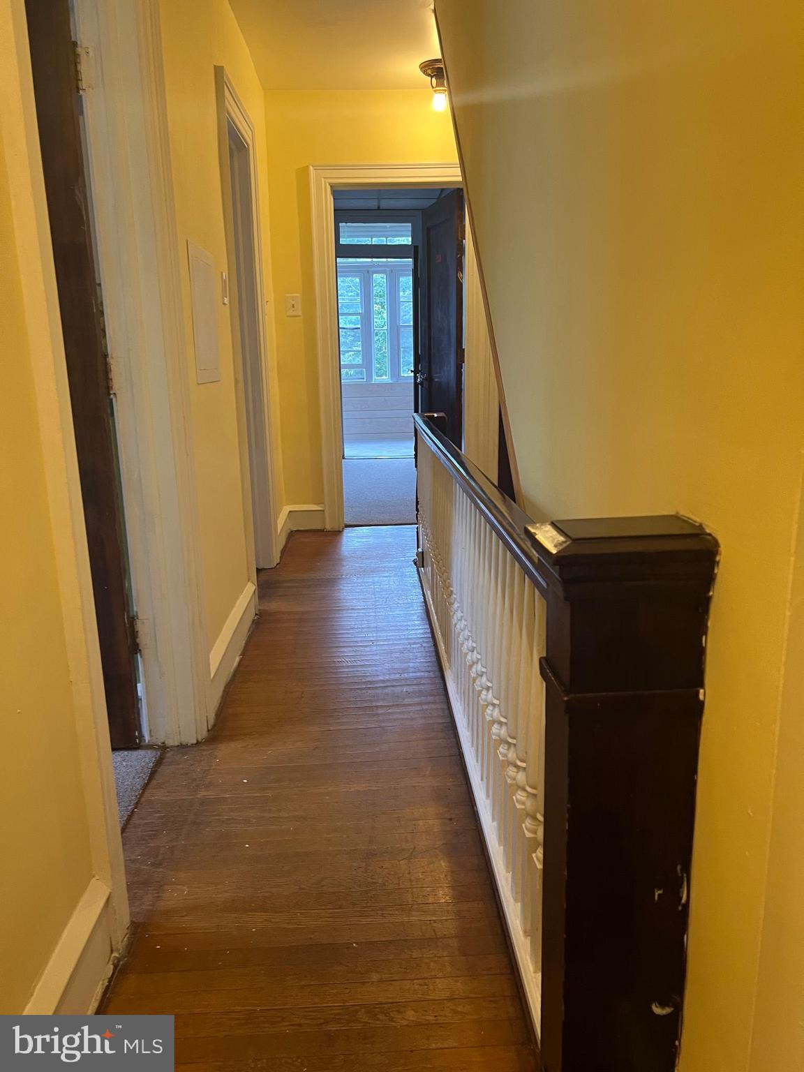 25 Broad Street Ashland, PA 17921 - Photo 38 of 138 a view of a hallway with wooden floor