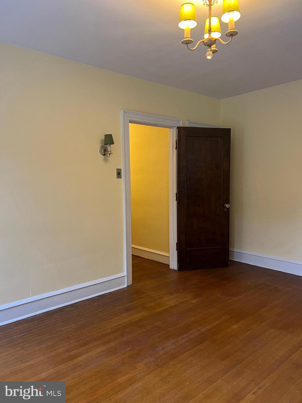 25 Broad Street Ashland, PA 17921 - Photo 43 of 138 a view of an empty room with wooden floor and windows