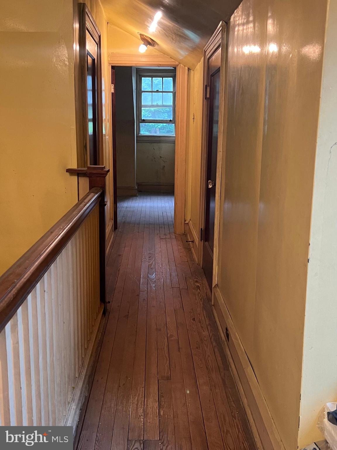 25 Broad Street Ashland, PA 17921 - Photo 58 of 138 a view of a hallway with wooden floor and staircase