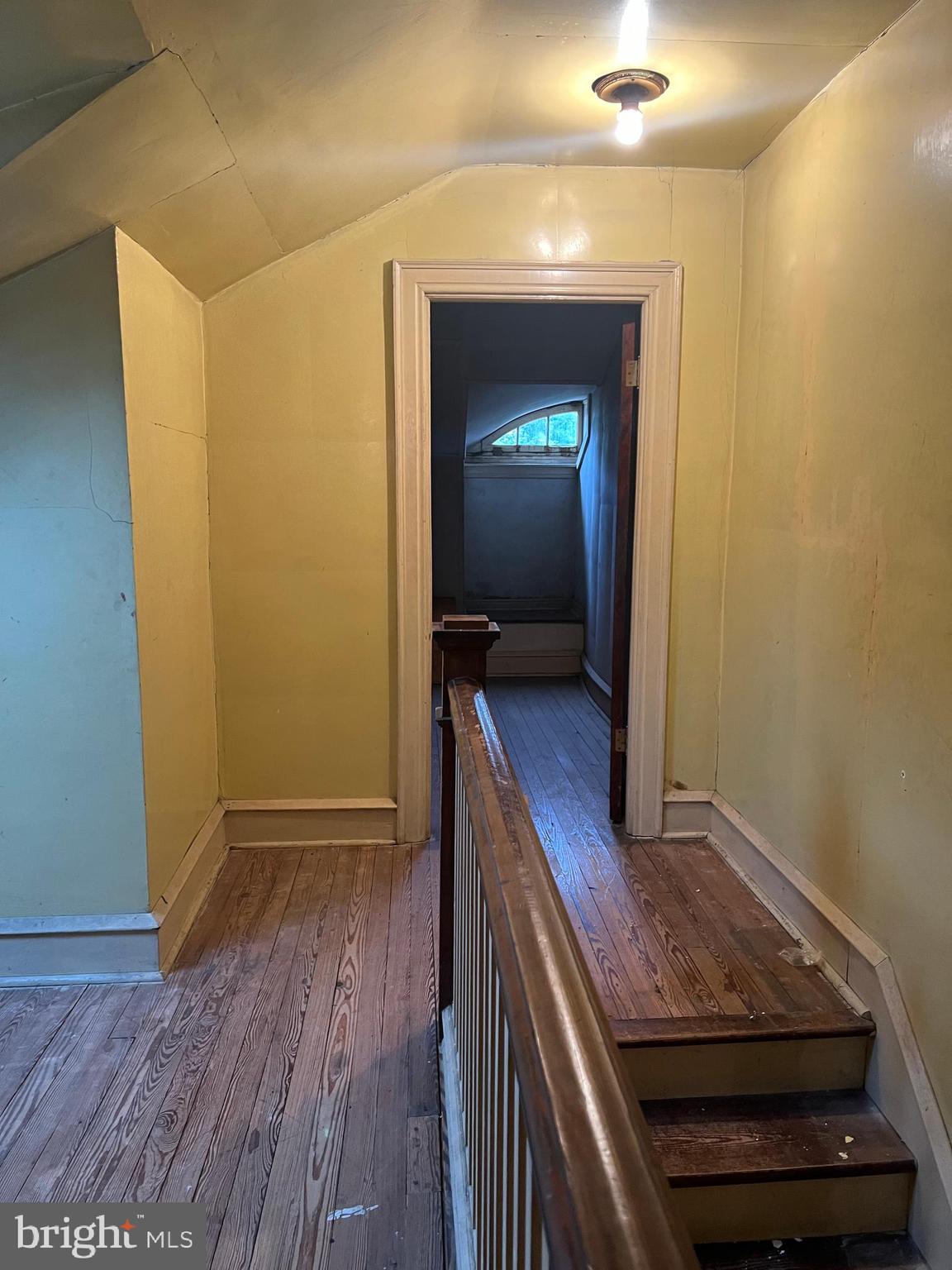 25 Broad Street Ashland, PA 17921 - Photo 59 of 138 a view of a hallway with wooden floor and a hallway