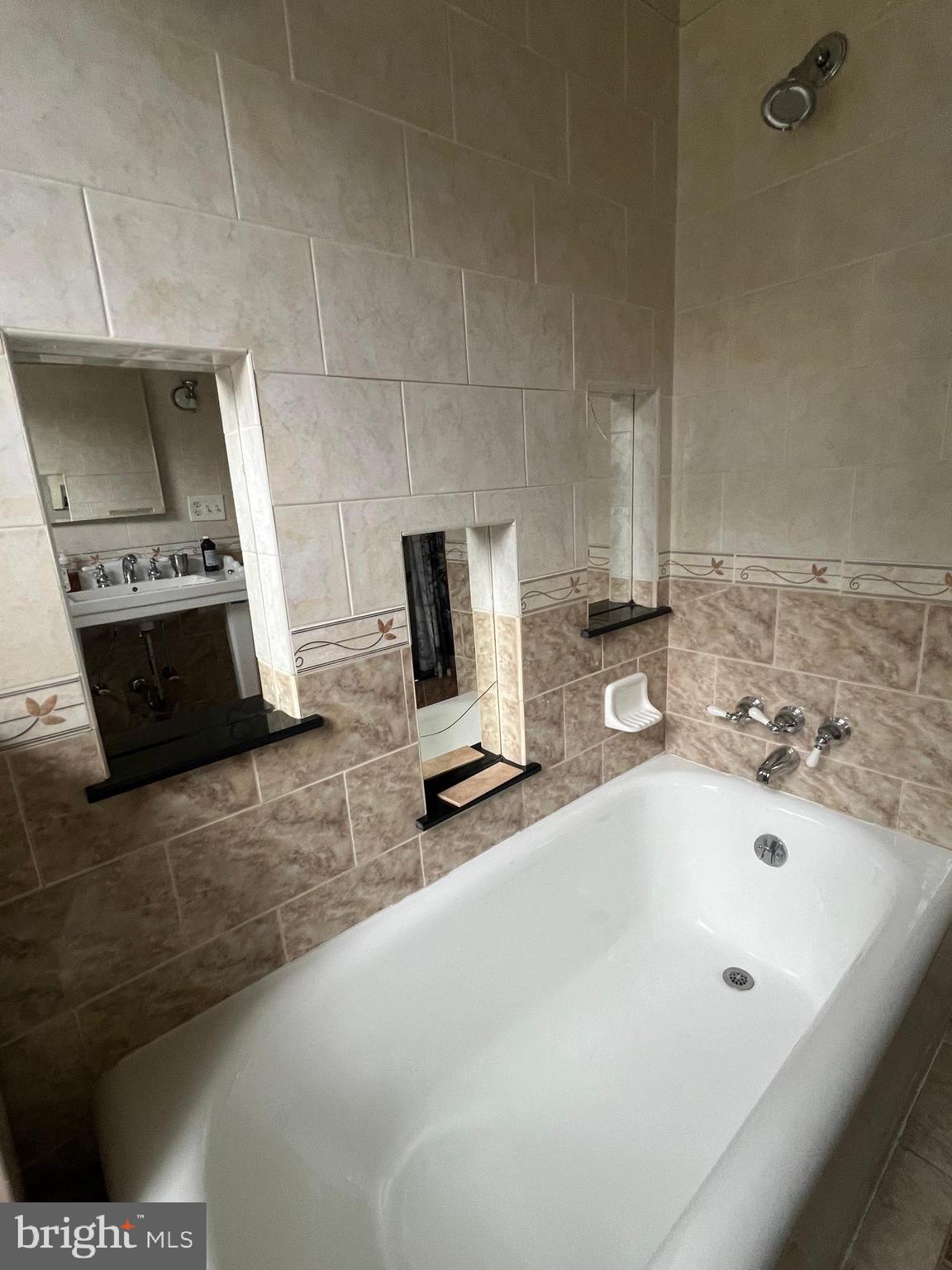 25 Broad Street Ashland, PA 17921 - Photo 70 of 138 a bathroom with a sink and a mirror
