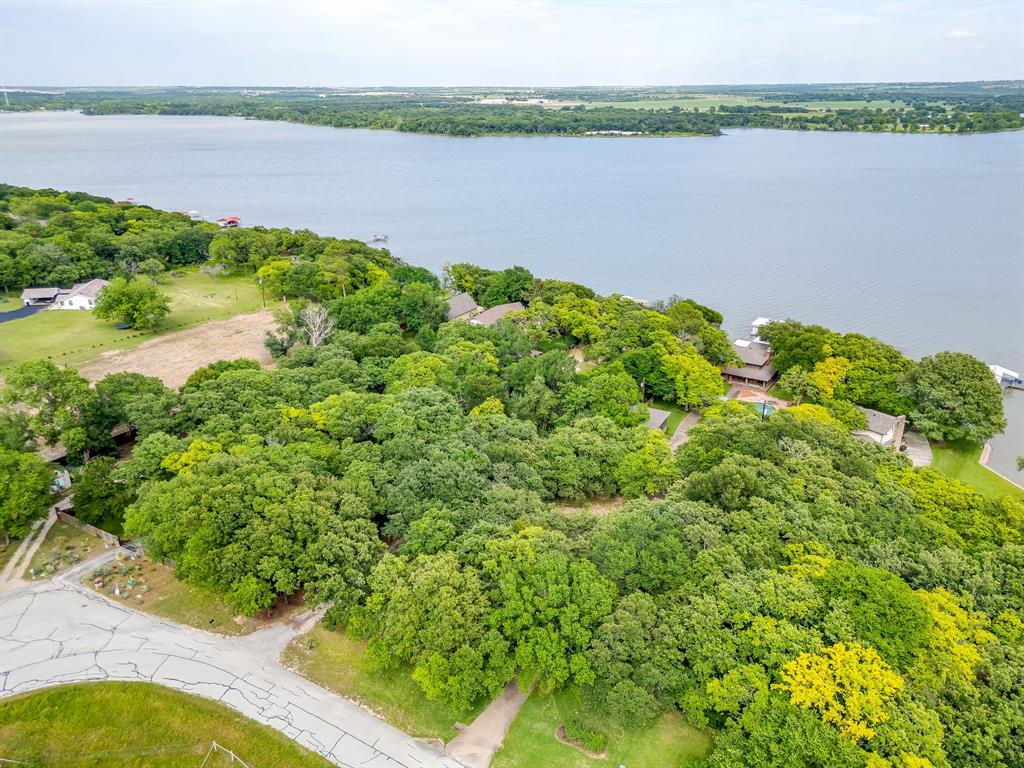 13350 Miller Road Azle, TX 76020 - Photo 1 of 40 a view of a lake from a yard